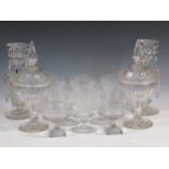 A collection of glassware to include a set of six vine engraved wine glasses, a pair of lustres, and