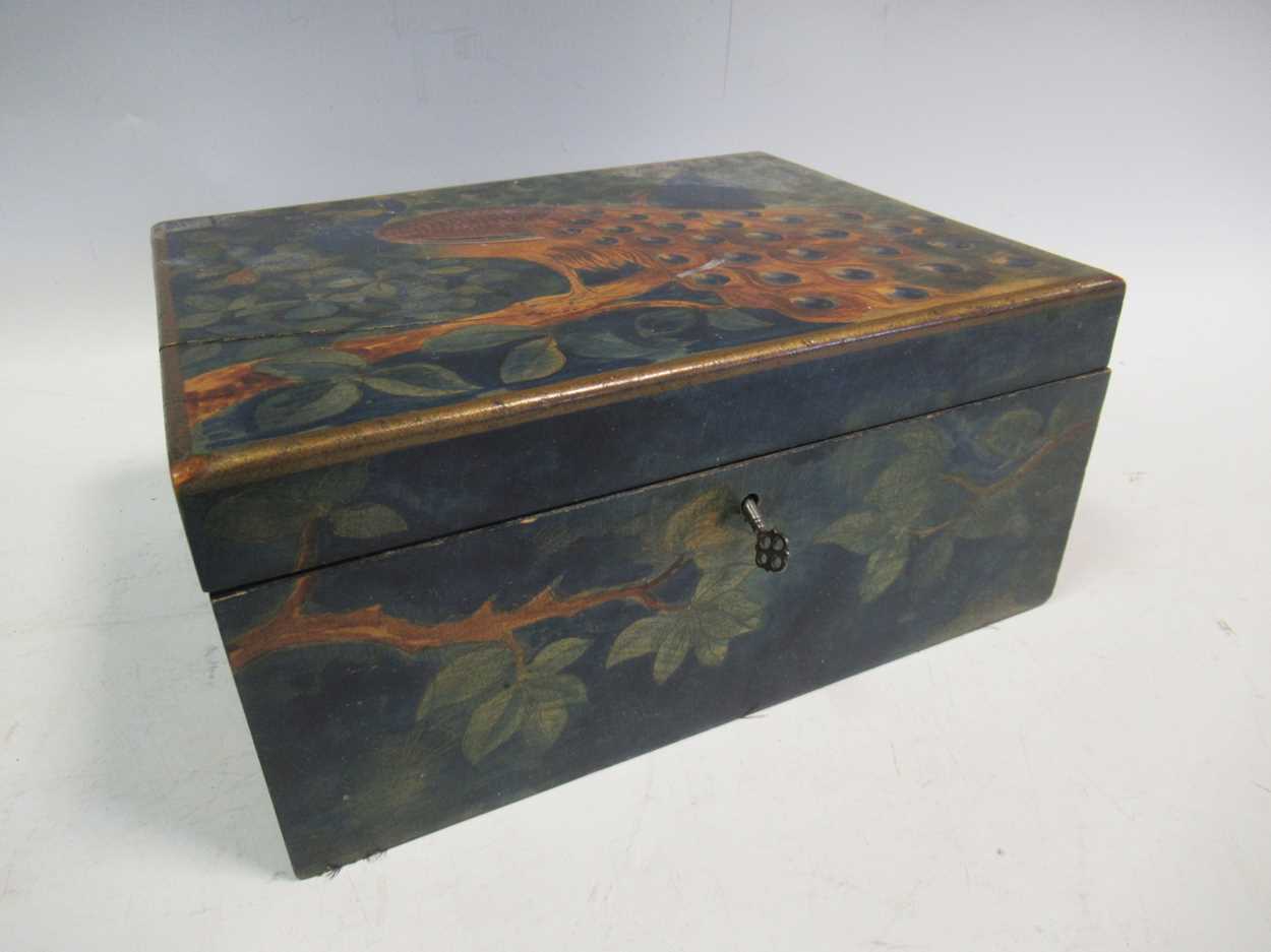 A late 19th century painted box decorated with peacocks 13 x 16.5 x 21cm