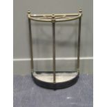 A late 19th/early 20th century brass umbrella/stick stand, 58cm high