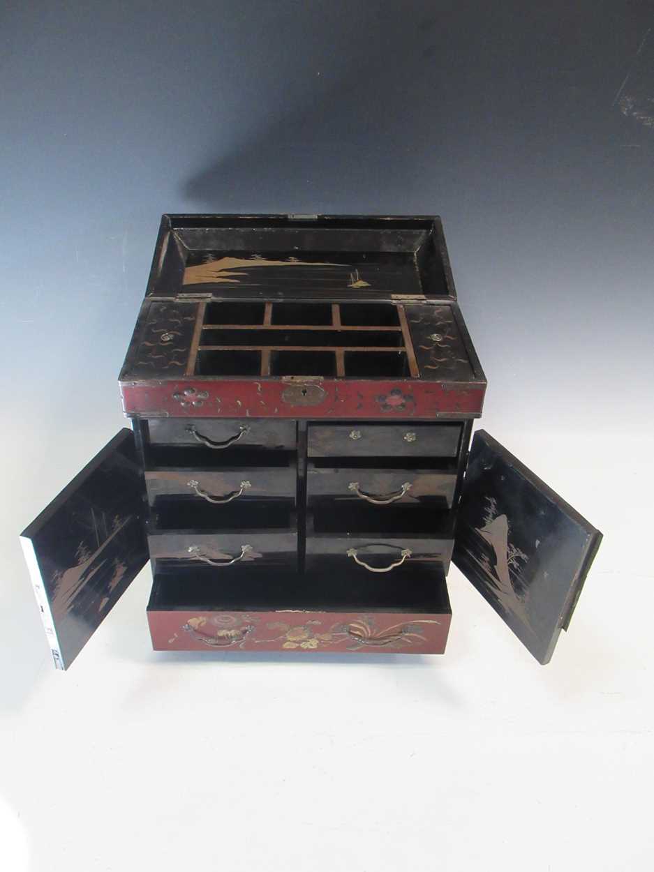 A Japanese meiji period lacquered table cabinet, the two doors enlcosing drawers, with side - Image 6 of 6