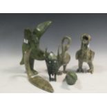 A collection of Inuit carvings of bird forms, some inscribed and some with Eskimo Art Canada