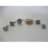 Two 9ct dress rings together with two pairs of 9ct gold blue topaz earstuds, 12.8g gross (4)
