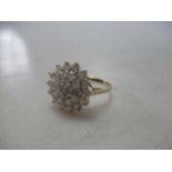 A 9ct gold diamond cluster ring, total diamond weight apx. 1ctCondition report: In overall good