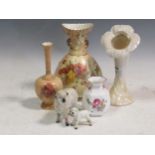 A Royal Worcester blush ivory vase, a smaller Royal Worcester blush ivory vase, a Belleek vase,