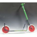 A vintage green painted push along scooter