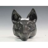 A cast iron doorstop modelled as a fox 16cm high together with another cast as a basket of
