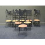 A set of eight iron chairs with farm animal top rails (8)