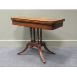 A Regency mahogany and rosewood crossbanded card table on four turned column supports 91cm wide