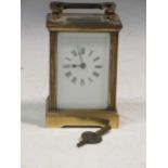 A gilt brass carriage timepiece 13cm high