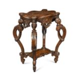 A French walnut two tier gueridon,