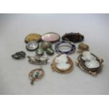 Two Cameo brooches tested to at least 9ct gold, gross weight 23.1g, together with eight other