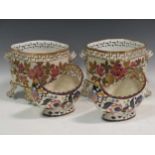 A pair of late 19th century porcelain planters and a pair of vases attributed to Zsolnay (4)