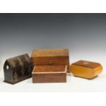 A coromandel casket, two work boxes, and a wooden box with a roulette wheel inset to the