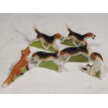 A set of Royal Worcester menu holders of a fox and hounds (6)Provenance:Landwade Hall, Exning,