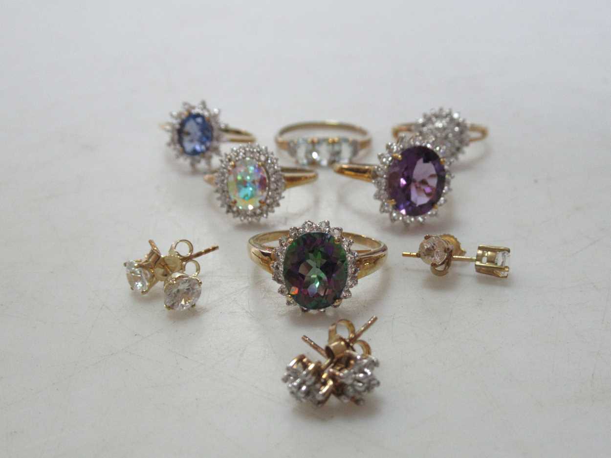 Six 9ct gold cluster rings, together with three pairs of 9ct earstuds 20.4g gross (9)