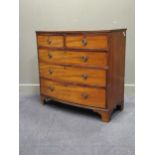 A Regency mahogany bow front chest of two short over three long drawers on bracket feet 100 x 102