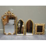 A pair of gilt wood arched mirrors 55 x 27cm, together with a Florentine style gilt mirror 40 x 36cm