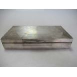 An Art Deco style silver table cigarette box, crested