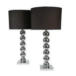 A pair of large-scale contemporary chrome table lamps,