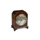 An early 20th century bur walnut cased table clock by Mappin & Webb,