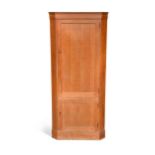 A Heal's oak floor-standing corner cupboard,