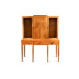 Attributed to Gordon Russell, an Art Deco walnut breakfront cabinet,