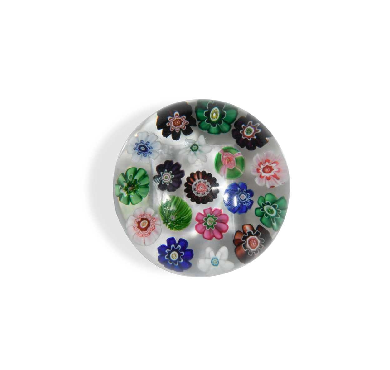 A small Clichy spaced millefiori glass paperweight,