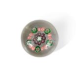 A small Clichy millefiori cluster and wreath glass paperweight,