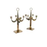 A pair of mid-century brass four branch candelabra,