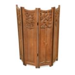 In the manner of Arthur Simpson of Kendal (1857-1922), an Arts & Crafts oak four panel screen,