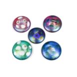 Five John Ditchfield iridescent glass paperweights,