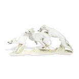 Hans Achtziger (1918 -2003) for Hutschenreuther, large porcelain group of three running greyhounds,