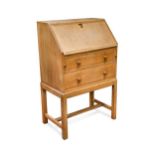 A small Heal's oak bureau on stand, circa 1930s,