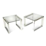 A pair of mid-century glass and chrome occasional tables,