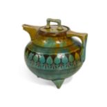 Attributed to Christopher Dresser, an earthenware teapot,