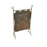 An Arts & Crafts copper fire screen