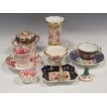 A Swansea cup and saucer, a Rockingham miniature basket etcCondition report: Fading to gitl and