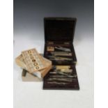 A rosewood case of drawing instruments and box of microscope slides by Baker