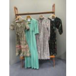 Vintage dresses.To include: Midi dress in green multil couloured paisley, with bright ribbon detail,