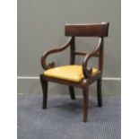 An eary 19th century childs open armchair