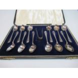 A cased set of silver teaspoons and tongs together with some American silver flatware, 35.1ozt