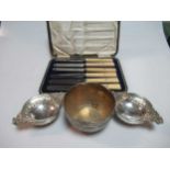 A silver sugar bowl, two silver tea strainer stands and a cased set of silver and mother of pearl