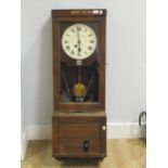 An oak cased Gledhill Brook Time Recorders Patent clocking in clock