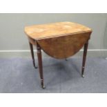 A 19th century Oval mahogany pembroke table, with one single draw on brass castors 72 x 79 x 59cm (