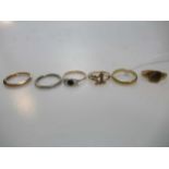 Three stone ring hallmarked 9ct gold, a signet ring hallmarked 9ct gold, a wedding ring hallmarked