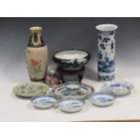 Three Chinese blue and white export porcelain saucers and one teacup 18th century, a 19th century