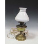 One Victorian brass oil lamp converted to electricity