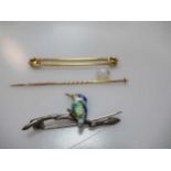 A stock pin brooch, stamped '18CT' weight 2.4g, together with a stick pin with a loose opal a.f,