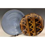 Three studio pottery bowls and two 20th century slipware bowlsCondition report: Largest plate has