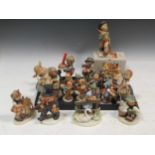 A collection of 23 Hummel figures